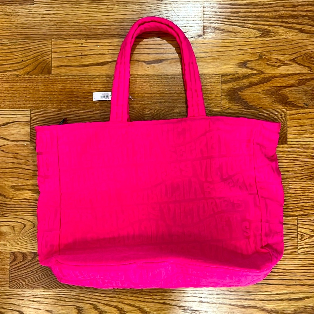 Victoria Secret tote bag in bright pink, new unused! Zipper closure.